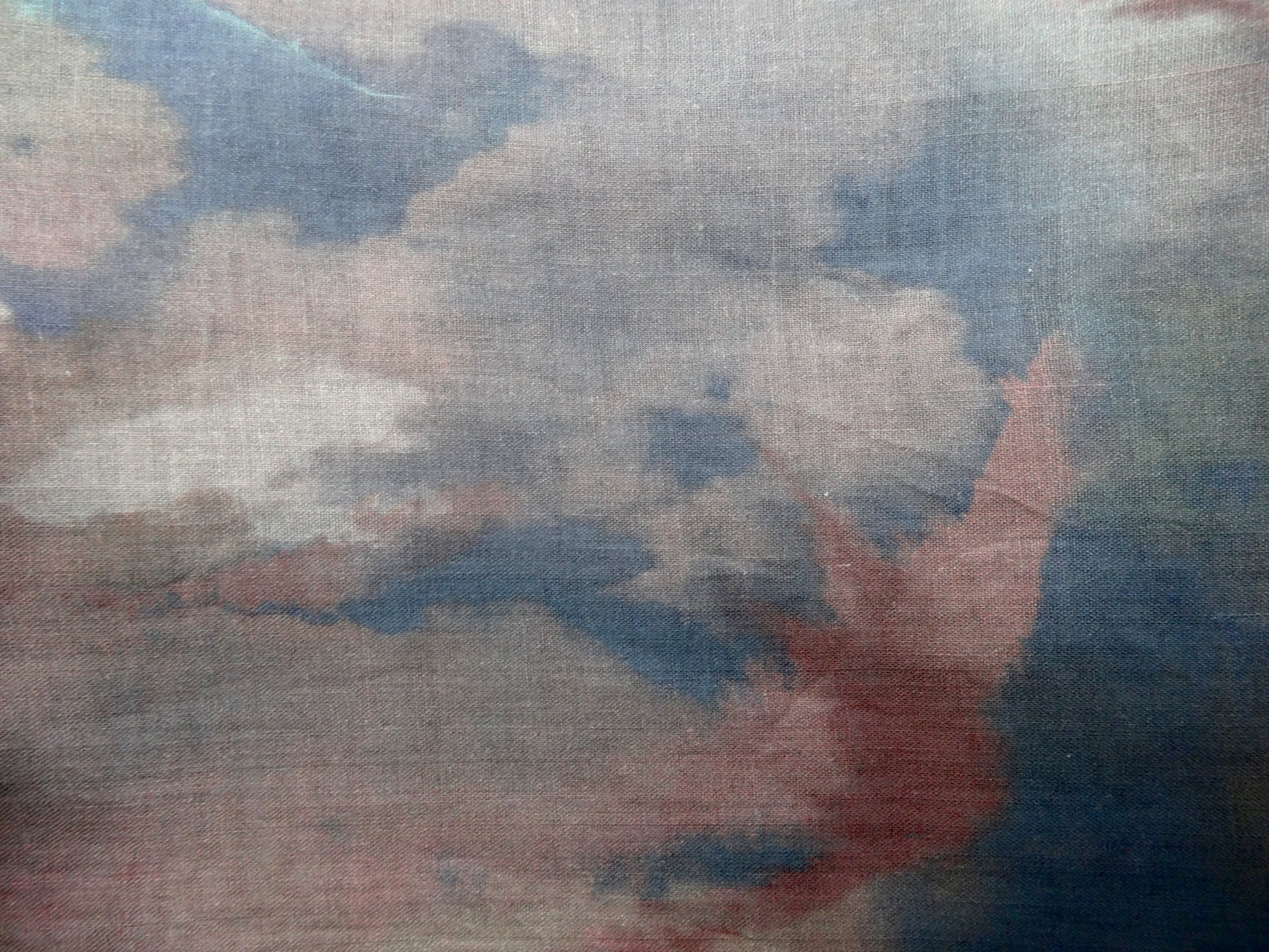 Photo of abstract digital print on lightweight ramie fabric remnant in pinks and navy blues. photographed from above.