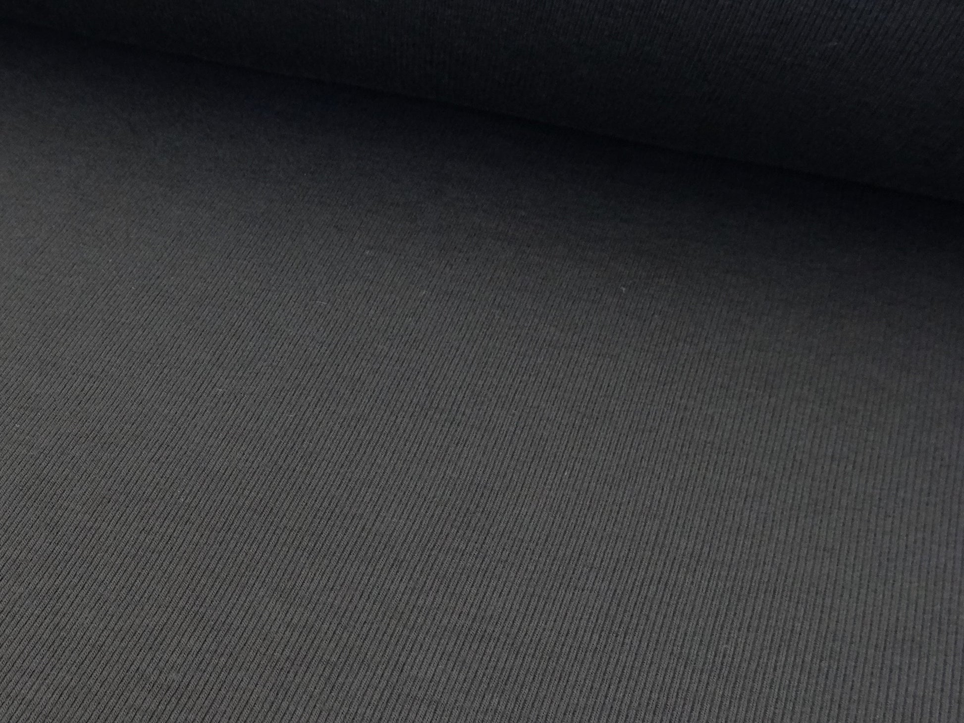 Close up Rib knitted fabric in plain black